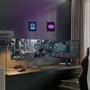 LG Gaming Monitors in dual-screen gaming setup with first-person shooter game and tactical map display