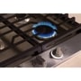 LG CBGU3039X Gas Cooktop with blue flame burner lit and control knobs in modern kitchen setting