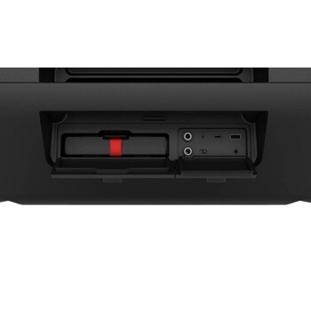 STAGE501_AUSALBK Party Speaker connection panel showing audio ports, USB port, and storage compartment with red pull tab - Close-Up