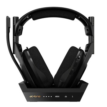Astro 939002126 gaming headset with padded ear cups on charging base showing XBOX compatibility and control buttons - Front View