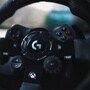 Logitech 941000147 gaming racing wheel with G logo center and colorful X Y A B buttons - Close-Up