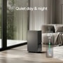 DT501BKR0 Dehumidifier infographic showing quiet operation at 40 dB in modern living room setting