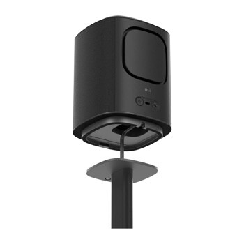 FS-M71 LG audio speaker with fabric texture mounted on black stand showing power button and connection ports
