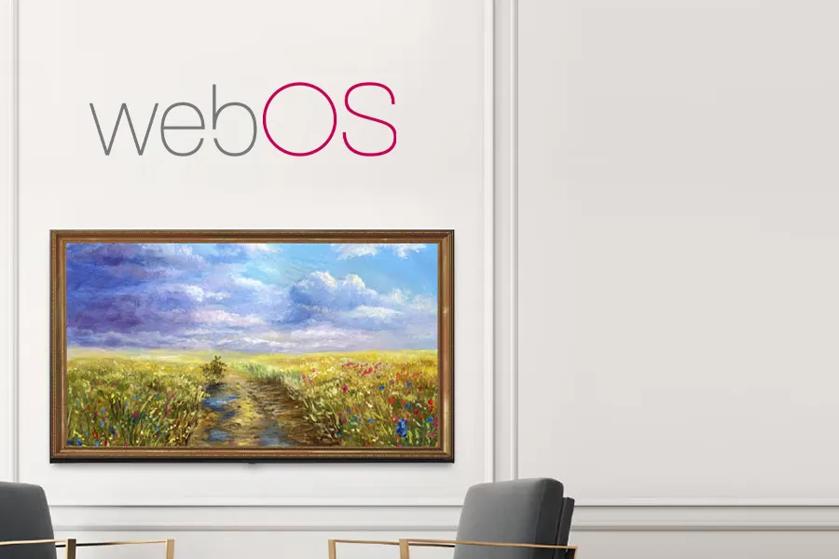 An LG OLED TV that looks like a framed landscape painting beneath the "webOS" logo on a light-colored wall.
