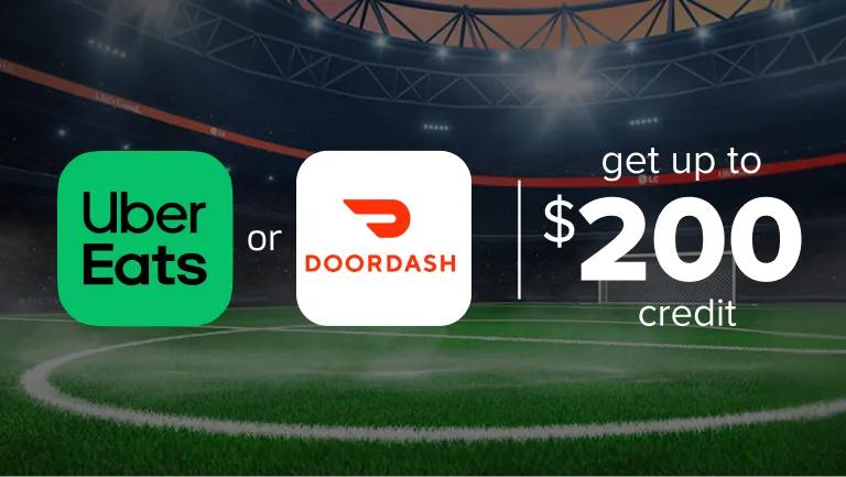 Text reads “Get up to $200 credit on Uber Eats or DoorDash” on background of a soccer stadium field.