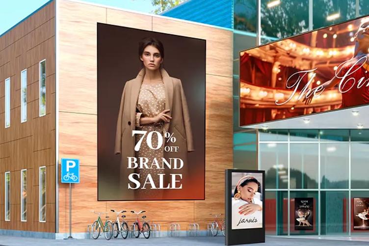 Building exterior with large sale advertisement of a woman in a beige coat and text "70% OFF BRAND SALE."