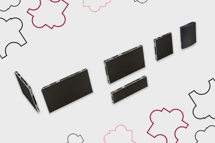 LSCB Direct View LED panels float on a pale grey background. Puzzle piece line-art in the top left and bottom right reference how the panels can be fit together to create unique DVLED displays.