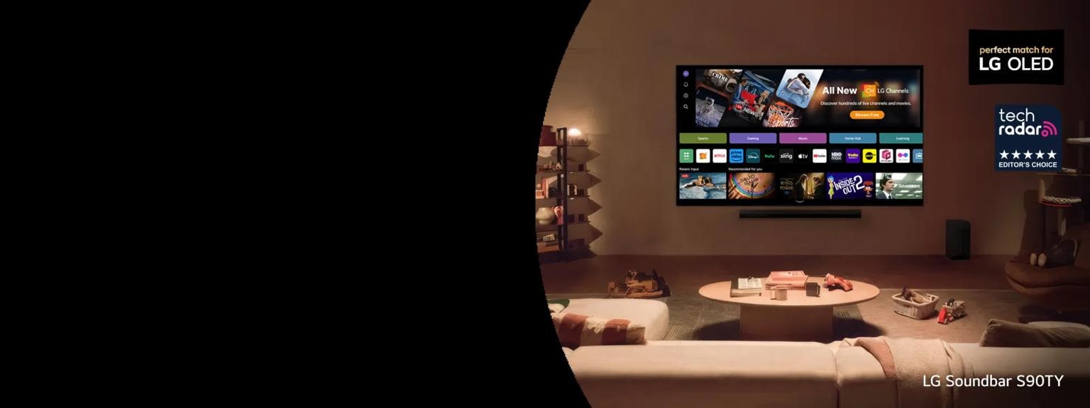 An LG TV  equipped with a matching soundbar displays various content in a cozy living room setting. “Perfect match for LG OLED” and “Tech Radar Editor’s Choice” badges. Text below reads “LG Soundbar S90TY”.