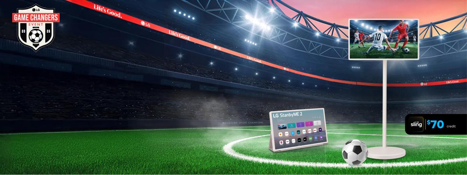 “Game Changers Event 2026” badge. 2 StanbyME Smart Portable Touch Screens appear in a bright soccer stadium setting. Pop-out text bubble read “Sling TV $70 credit”.