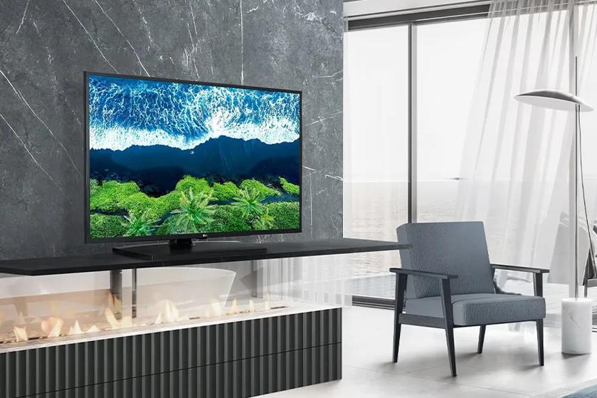 Hotel room with an LG TV displaying a vibrant nature scene.