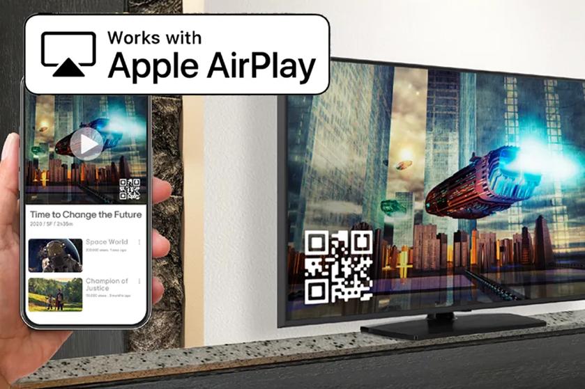 A smartphone displaying a futuristic cityscape video is mirrored on a TV screen, with an Apple AirPlay label above.

Transcribed Text:

Works with Apple AirPlay